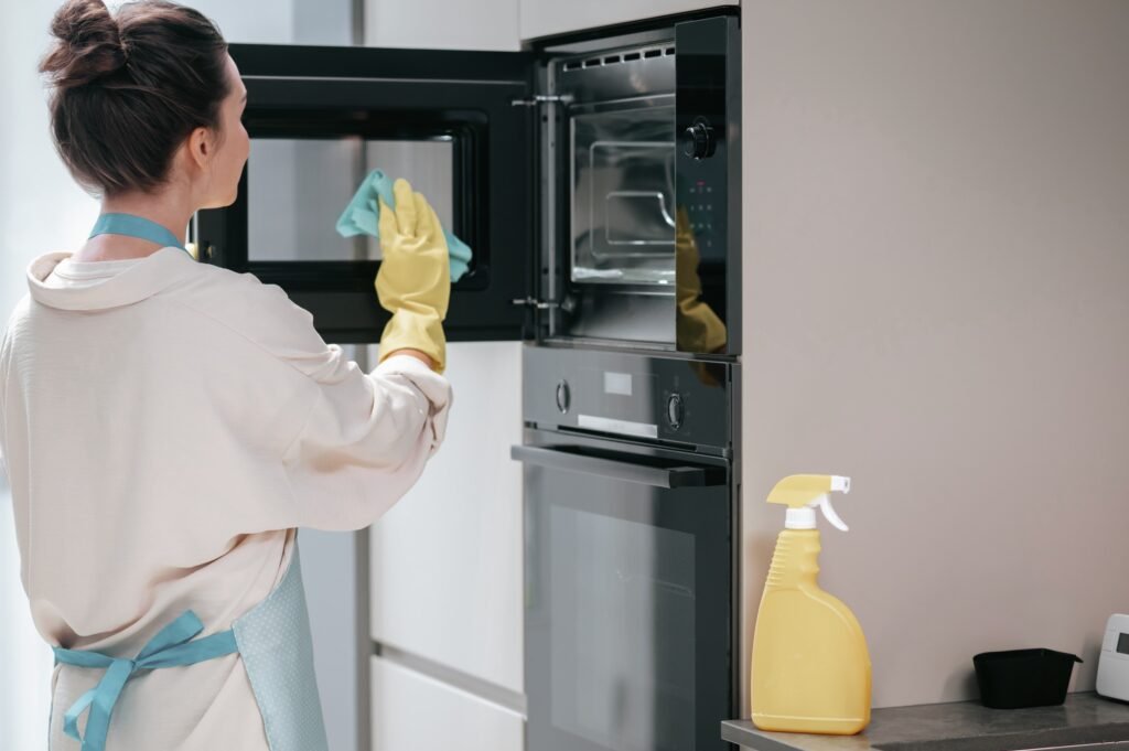 cleaning-kitchen-housewife-yellow-gloves-cleaning-kitchen (1) (1)